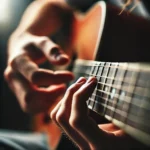 Bàn tay đang chơi hợp âm E thứ trên đàn guitar acoustic