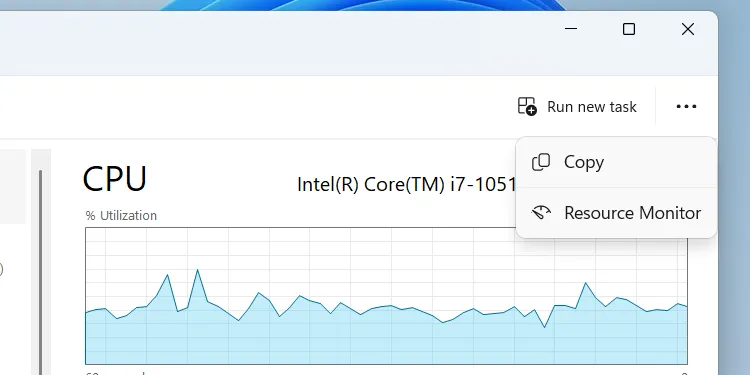 Cách mở Resource Monitor từ tab Hiệu suất của Task Manager trên Windows, hiển thị menu tùy chọn.