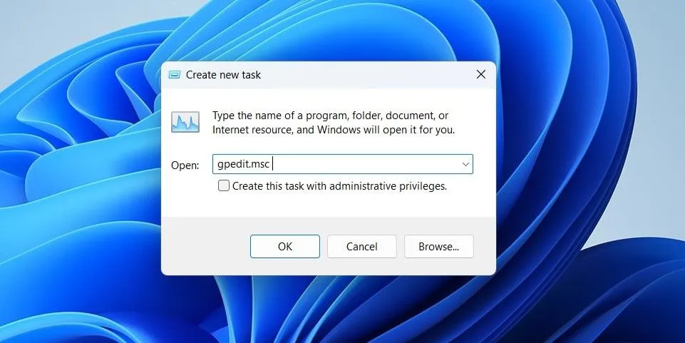 Cửa sổ Task Manager hiển thị tùy chọn 'Run new task' với lệnh 'gpedit.msc' để khởi chạy Group Policy Editor