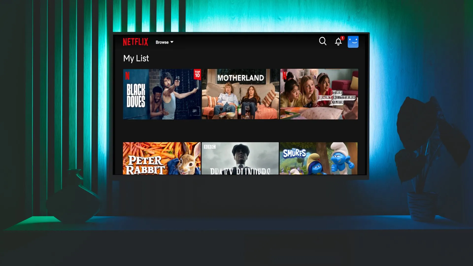Giao diện Apple TV hiển thị mục Continue Watching và Watchlist với nội dung Netflix