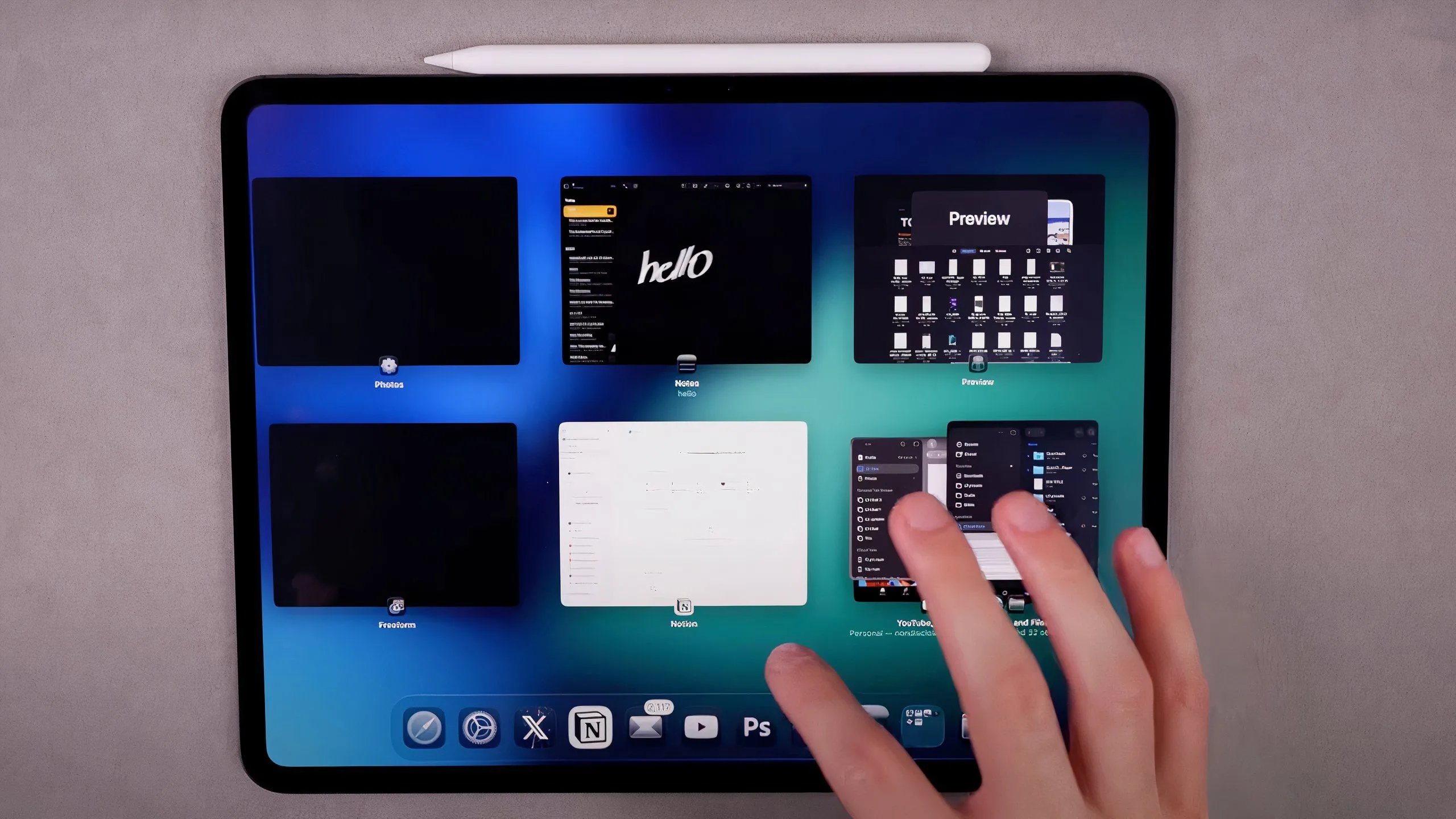 Giao diện Exposé trên iPadOS 26 hiển thị các cửa sổ ứng dụng đang mở