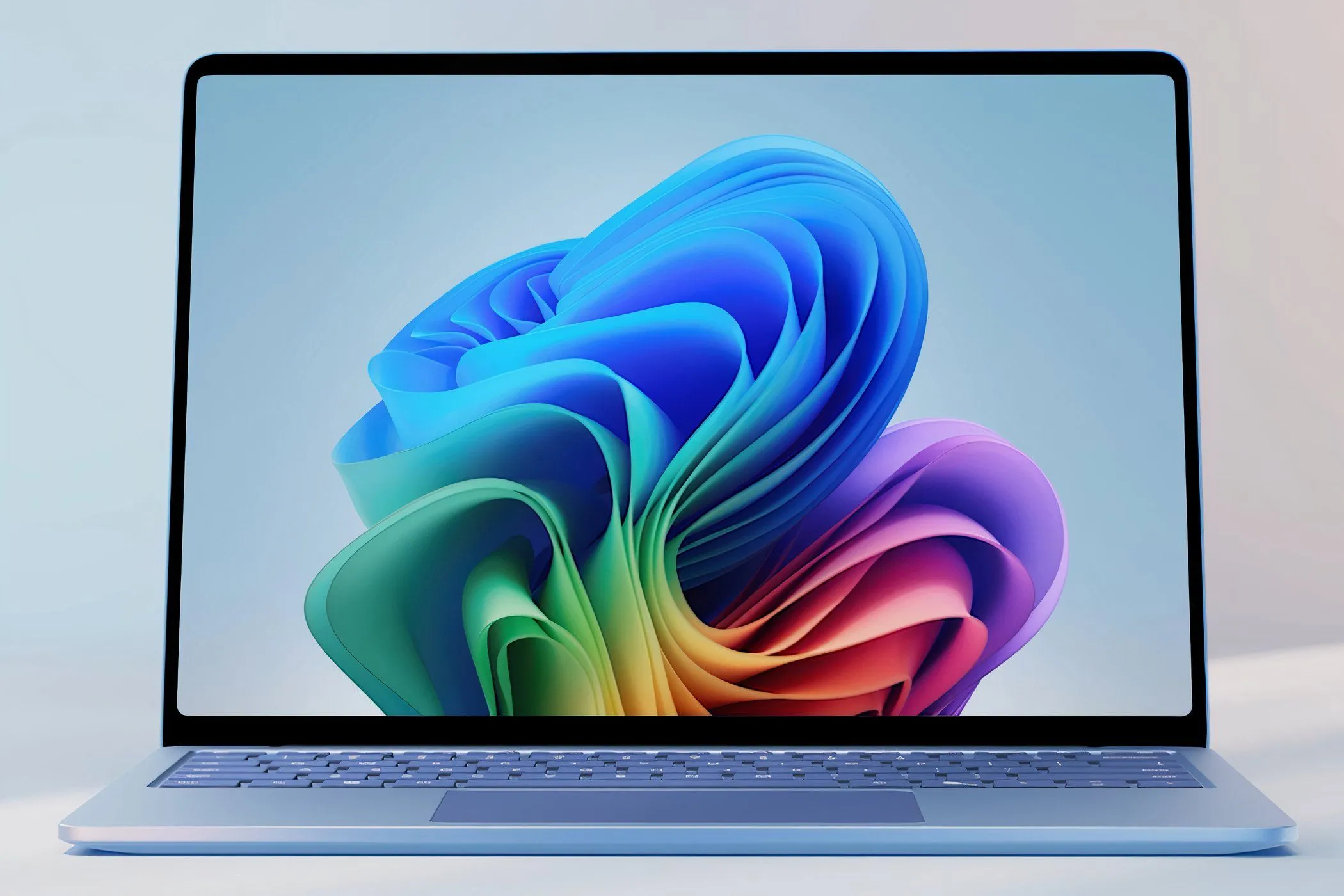 Laptop Microsoft Surface Laptop 7th Edition màu bạch kim mở ra, bàn phím và màn hình hiển thị