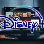 Logo Disney Plus nổi bật trên nền người dùng đang xem phim, thể hiện trải nghiệm giải trí tại nhà.