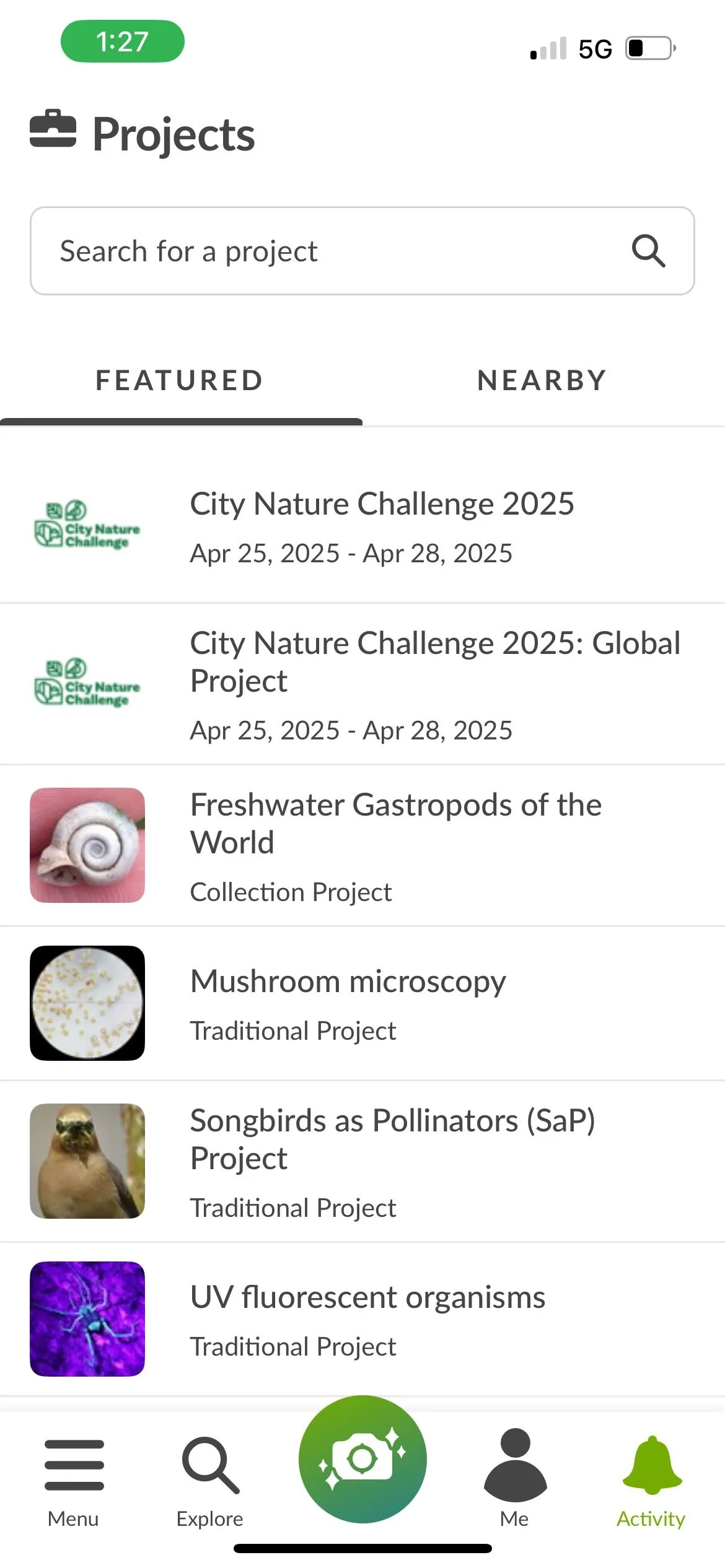 Màn hình ứng dụng iNaturalist hiển thị chi tiết một quan sát loài, kèm theo phần trăm tự tin và bình luận từ cộng đồng.