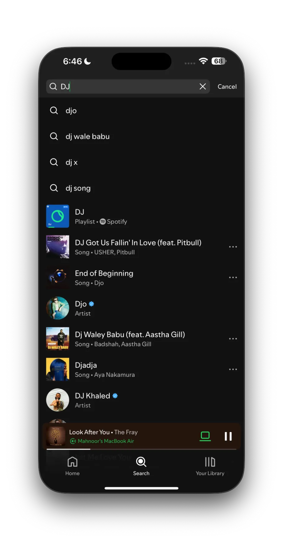 Màn hình ứng dụng Spotify, đang gõ từ khóa &quot;DJ&quot; vào thanh tìm kiếm để truy cập tính năng Spotify AI DJ.