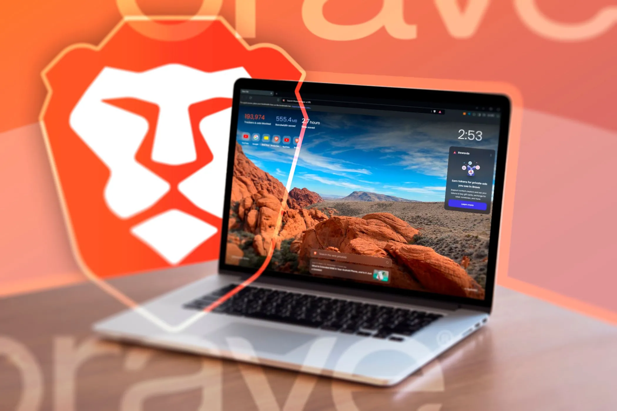 Máy tính xách tay hiển thị trình duyệt Brave và logo Brave ở nền