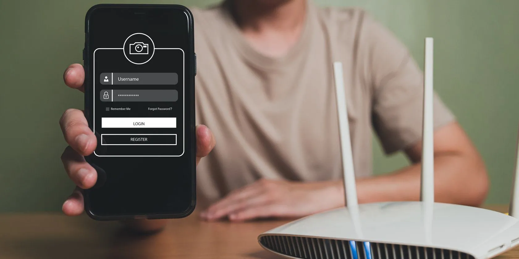 Người dùng đang kết nối điện thoại với router Wi-Fi, minh họa việc thiết lập mạng ẩn để bảo mật.