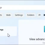 Thanh tìm kiếm Windows 11 với từ khóa "view advanced system settings"